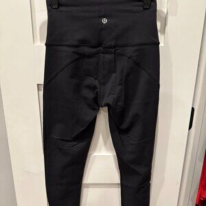 Lululemon Size 4 Leggings with Pinholes